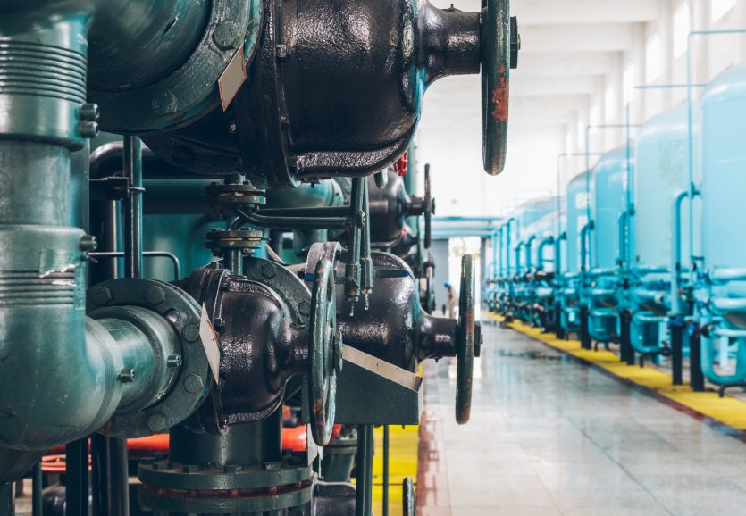 steel pipelines and cables in a plant