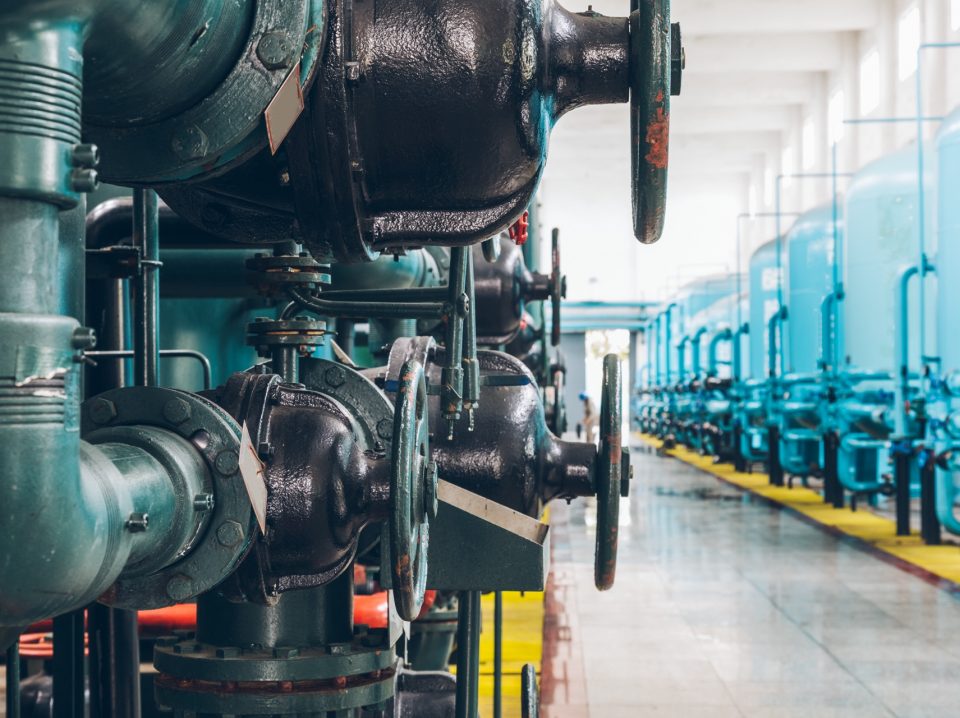 steel pipelines and cables in a plant